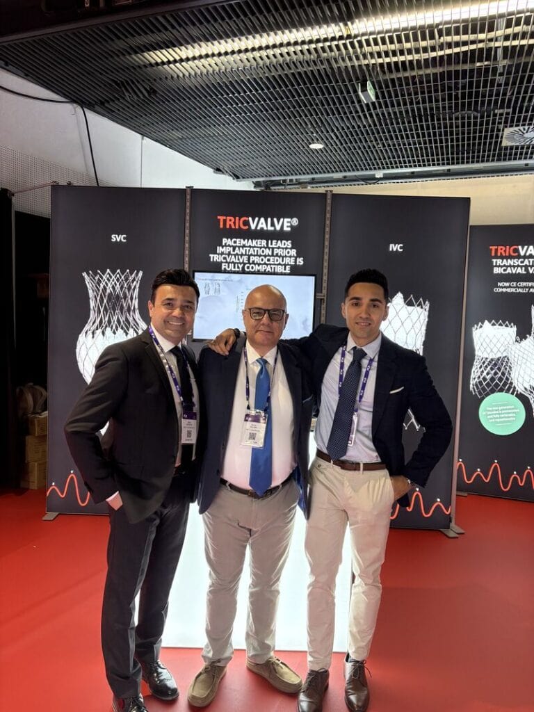 P&F team posing at the branded booth at EuroPCR 2025