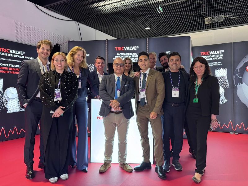 P&F team posing at the branded booth at EuroPCR 2025