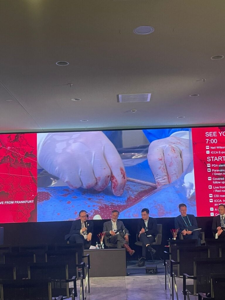 Biohazard medical professionals performing surgery in a hospital setting, demonstrating healthcare and medical procedures.