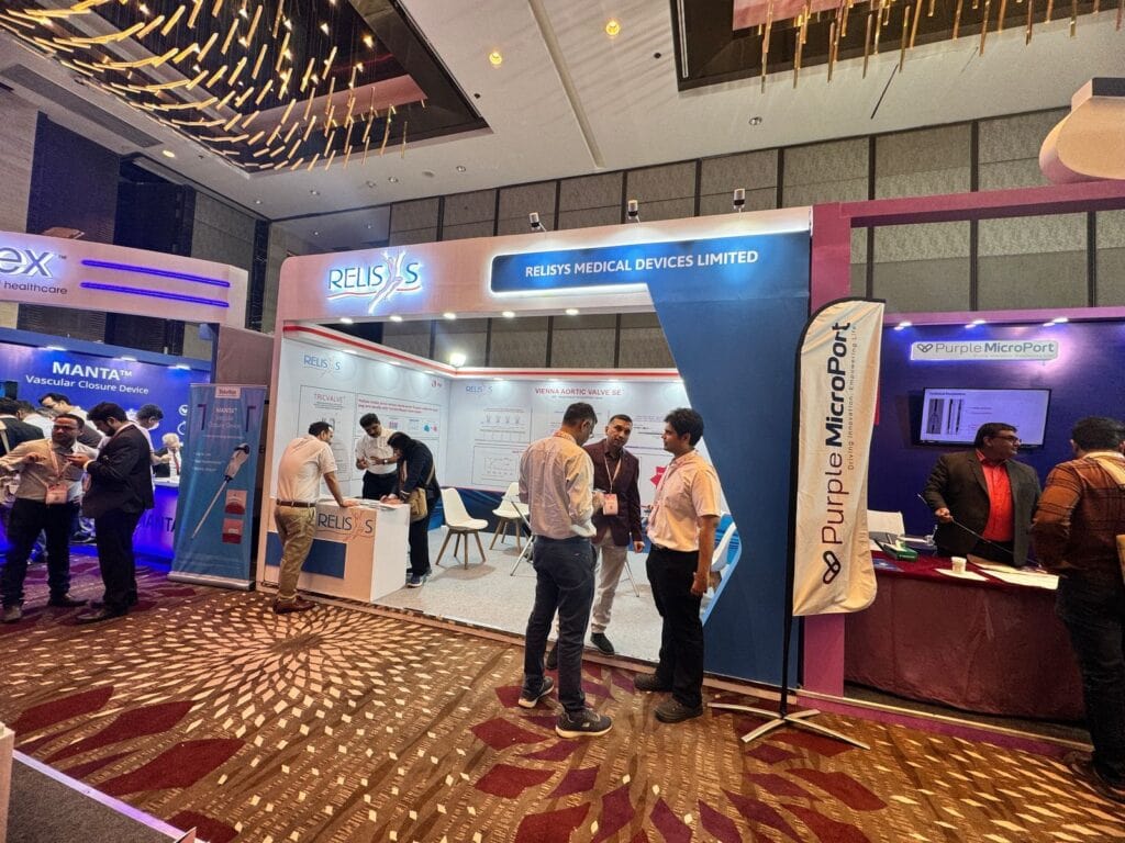 Professionals standing in front of booths at the Structural Heart Summit Mumbai 2025