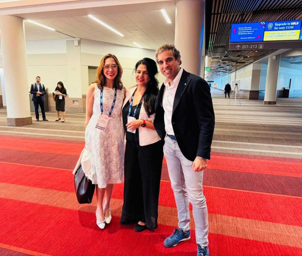 Three people posing at HFSA Annual Scientific Meeting 2025